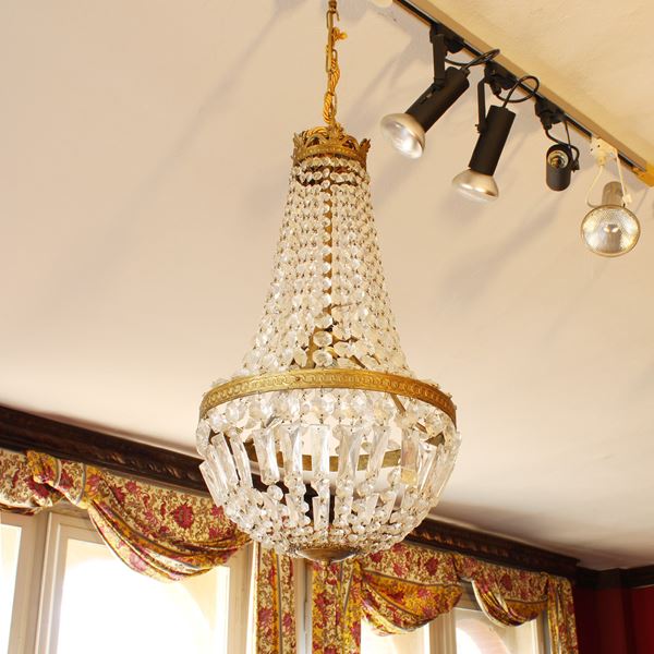 Coppia di lampadari in bronzo dorato