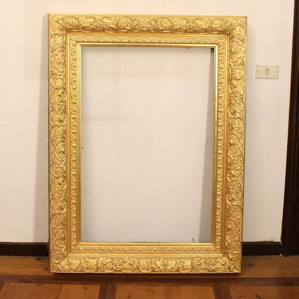 Specchiera in legno e pastiglia dorata