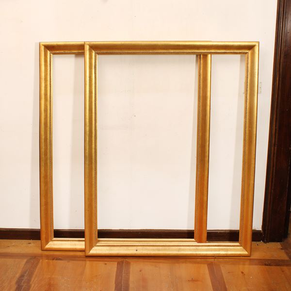 Coppia di specchiere in legno dorato