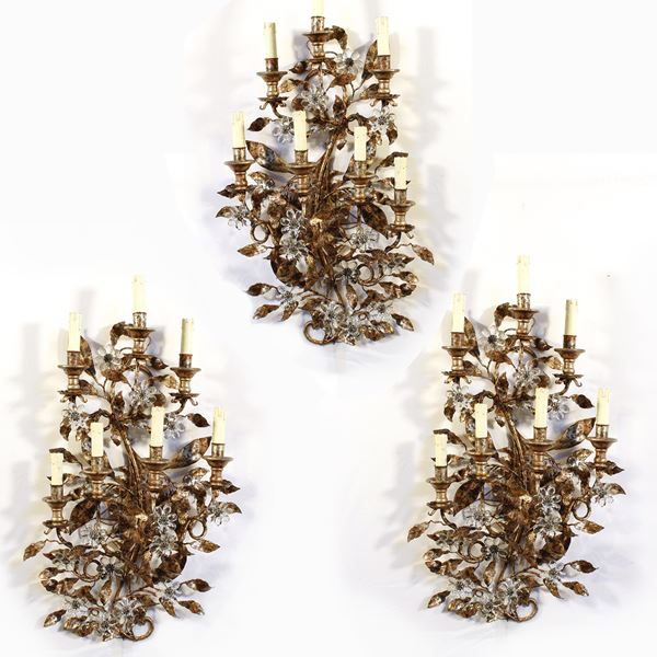 Tre appliques a sette luci