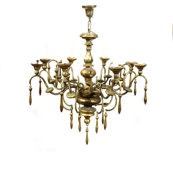 Lampadario a otto luci in legno dorato a mecca