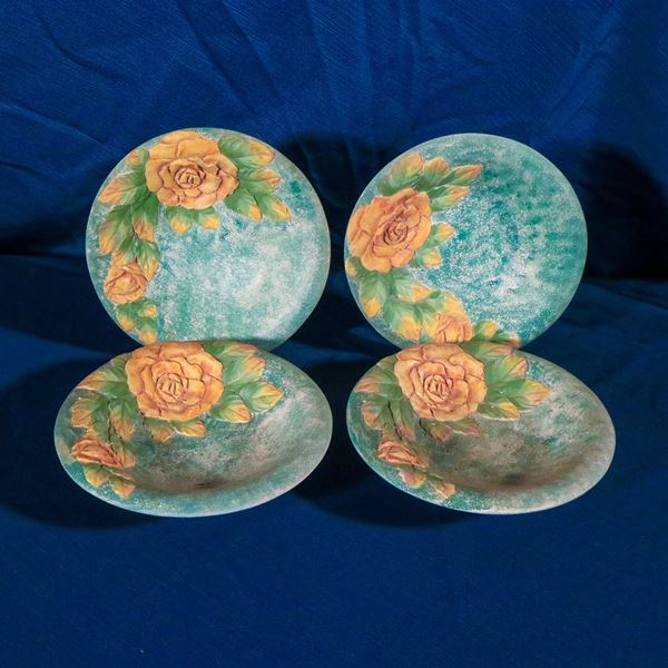 Quattro piatti in ceramica
