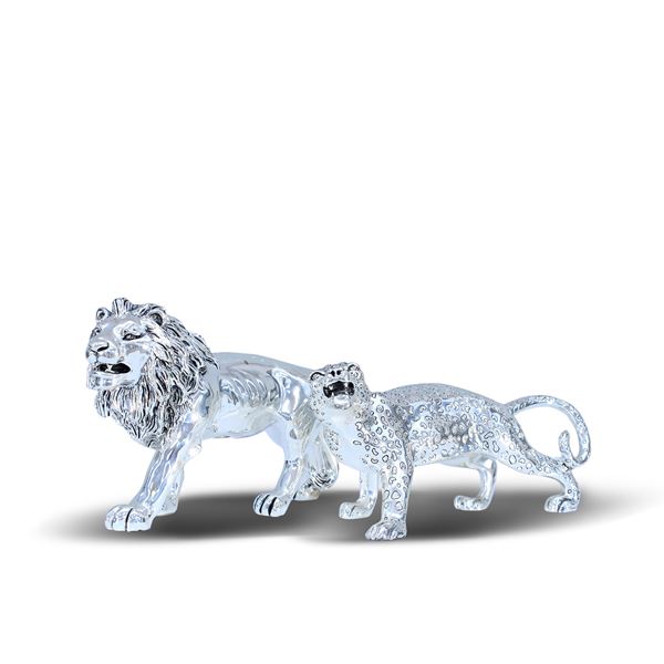 Coppia di sculture in metallo argentato