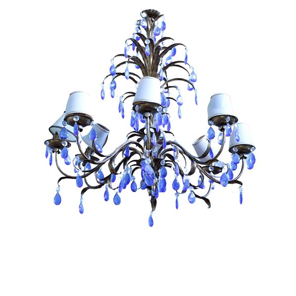 Lampadario a otto luci in metallo dorato