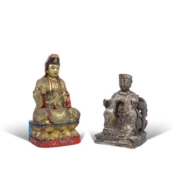 Due sculture in legno laccato e dorato