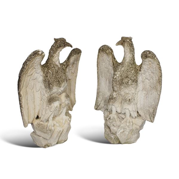 Coppia di sculture in agglomerato