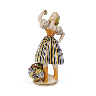 Manifattura italiana, Scultura in porcellana di figura femminile con cesto di fiori