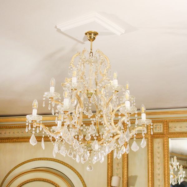 Lampadario a dodici luci in vetro e ottone