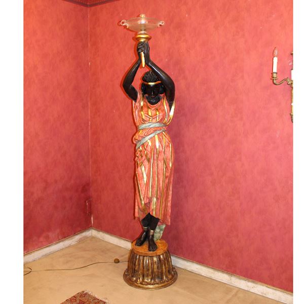 Scultura in legno laccato e dorato