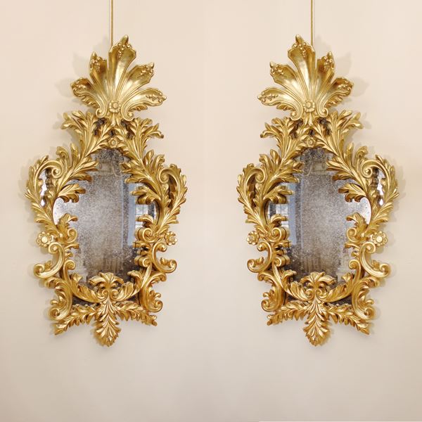 ♦ Coppia di specchiere in legno dorato