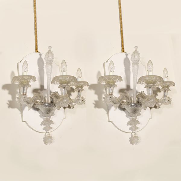 Coppia di appliques in vetro trasparente