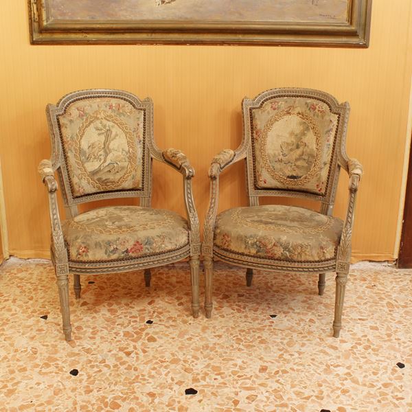 Quattro poltrone in legno laccato